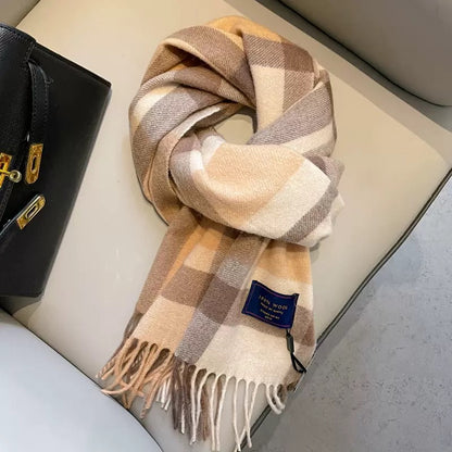 Edith 100% wool winter plaid scarf in warm beige, brown, and cream checks with fringe.